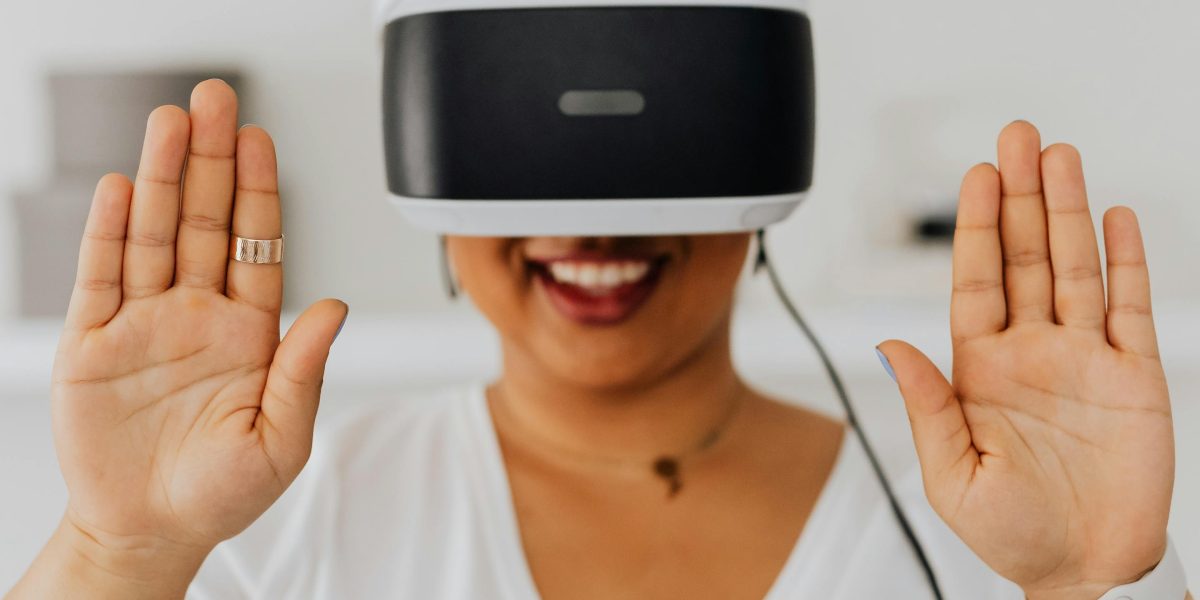 A person experiencing augmented reality or virtual reality, envisioning immersive future gaming and interaction.