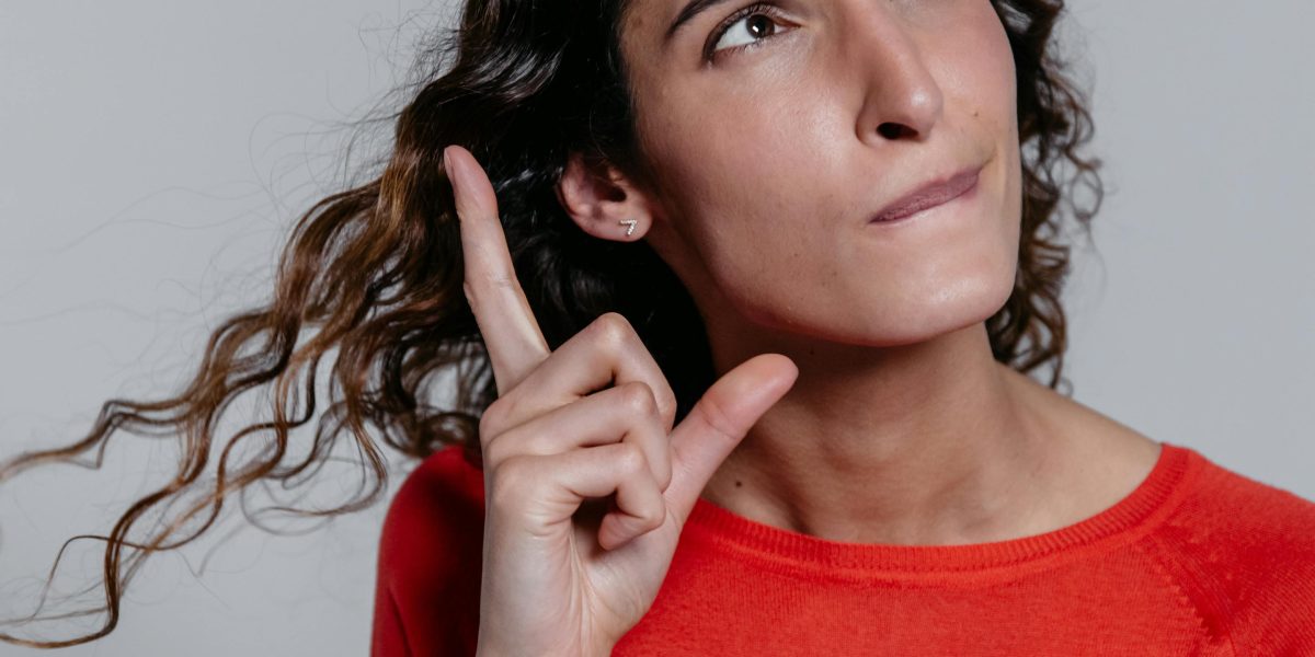A person in deep thought, symbolizing the careful consideration needed to balance phone customization with optimal device performance and battery life.