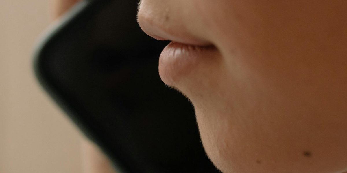 A person effortlessly unlocking their smartphone using facial recognition technology.