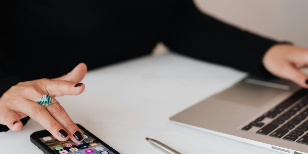 A person efficiently using their smartphone for quick access, demonstrating productivity.