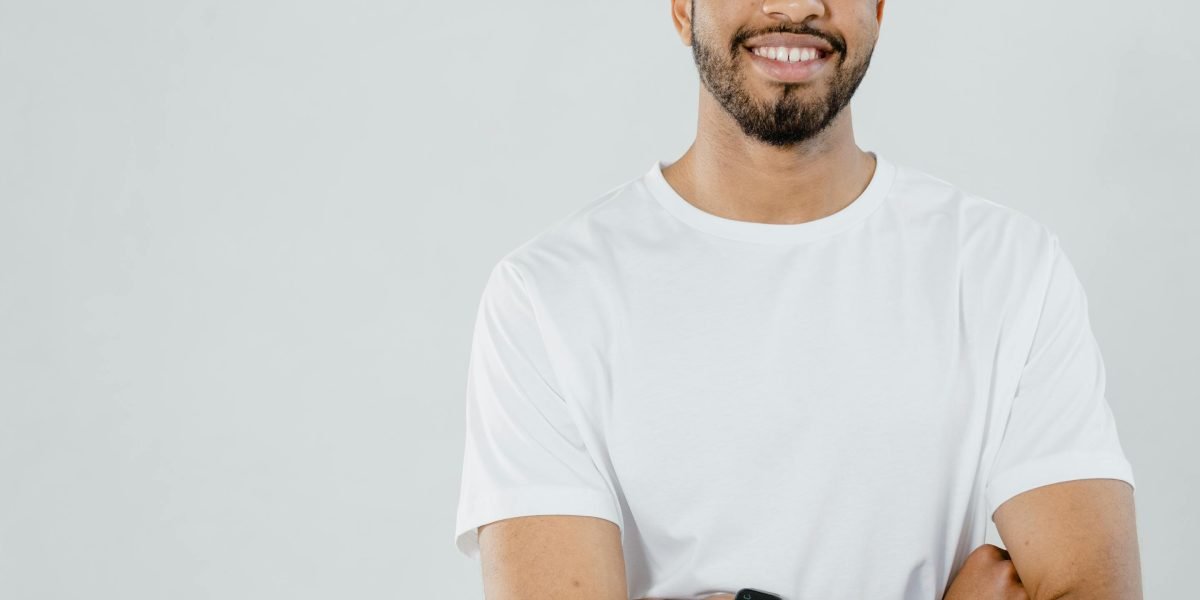 A person appears confident and satisfied while researching smartphone options.