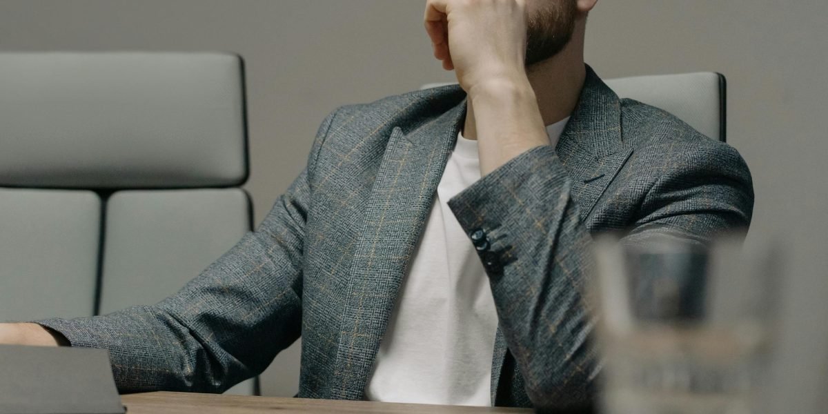 An individual in a professional setting, confidently making a decision after careful consideration, reflecting informed choices.