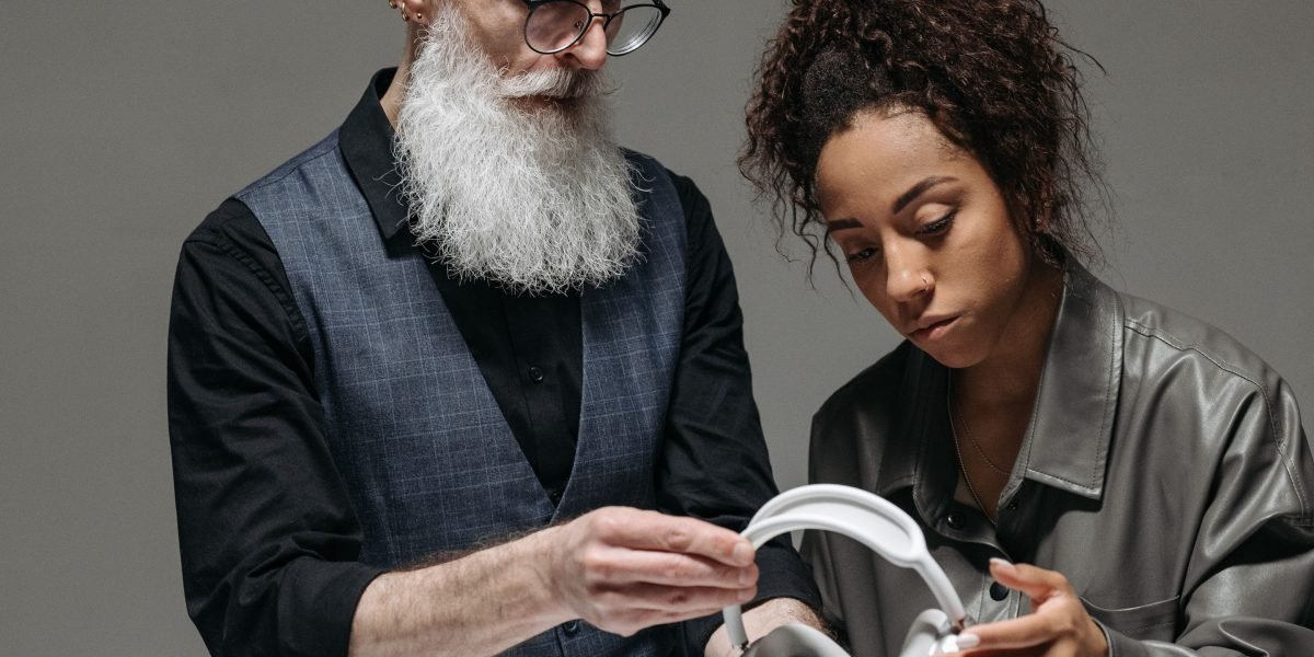 A person intently comparing various tech reviews and community discussions online to make an informed purchase decision.