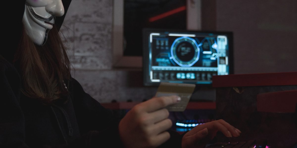 A person carefully handling digital information or a device, symbolizing the importance of security and privacy.