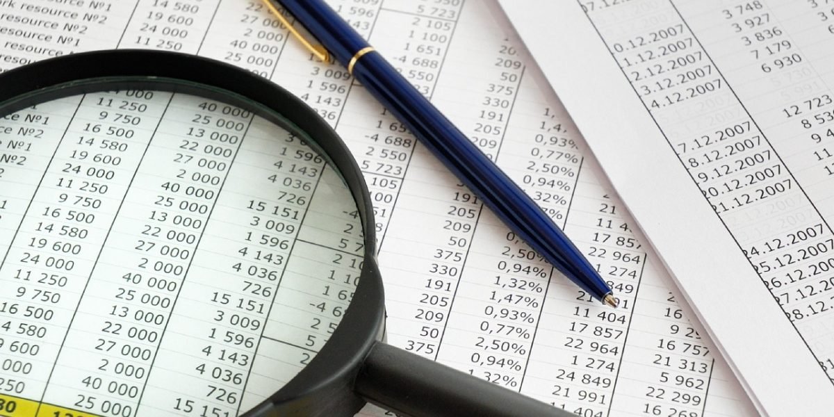 A professional reviewing data and reports to understand a platform's trustworthiness.
