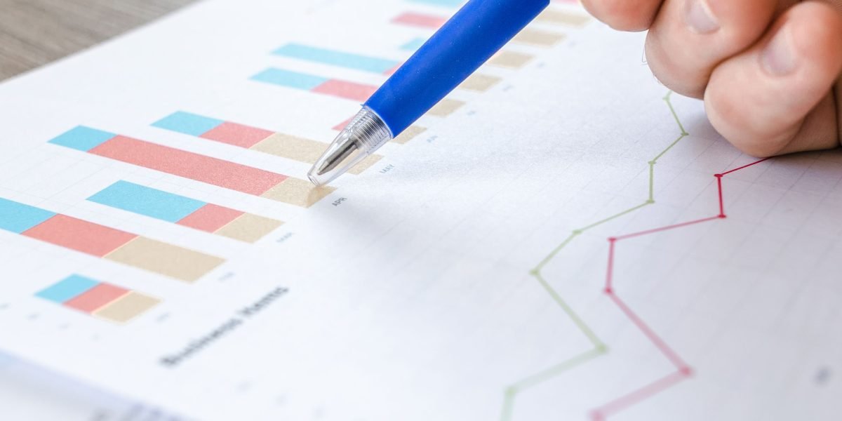 Professionals engaged in deep analysis of market trends and predictions, reflecting the article's focus on price forecasts.