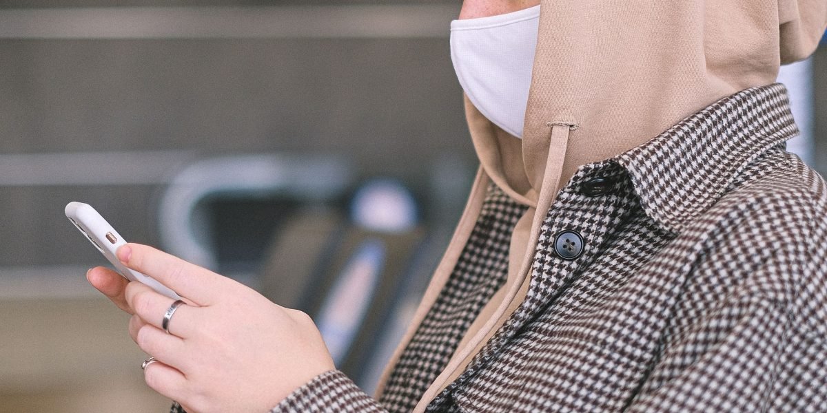 A person feels reassured and confident about their phone's safety with robust protection.