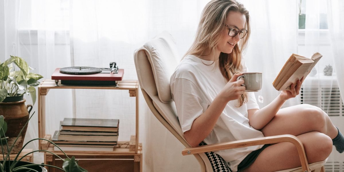 A person appreciates the simple, lightweight feel of their phone, embracing a minimalist aesthetic.