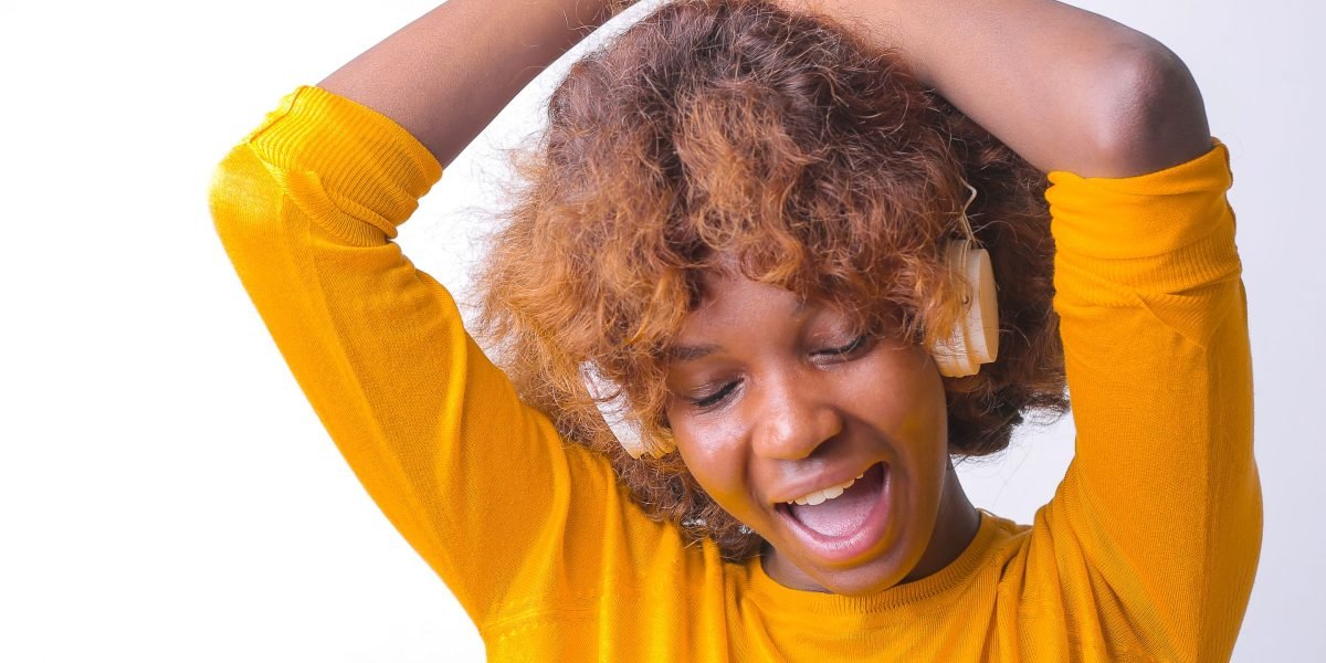 A person experiencing a sense of satisfaction and happiness after a task or break.