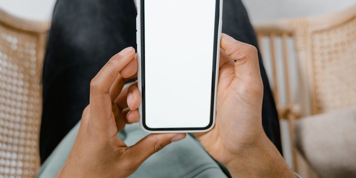 A person comfortably holding and interacting with their phone, highlighting good grip and ergonomics.