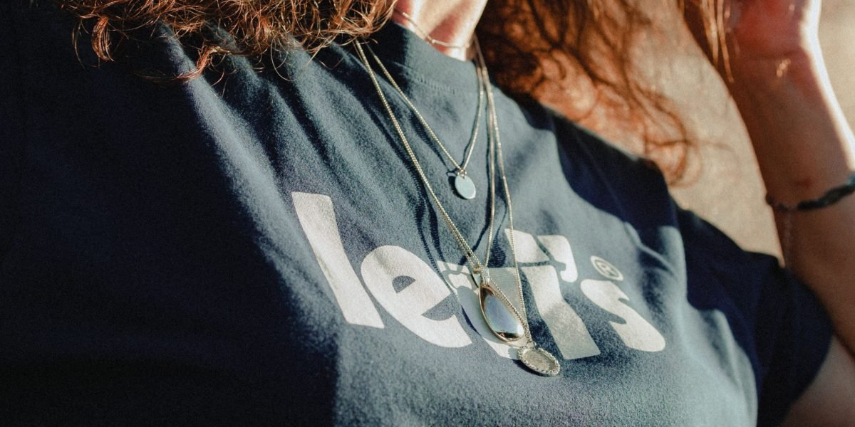 A person confidently selecting an item that reflects their individual style and preferences.