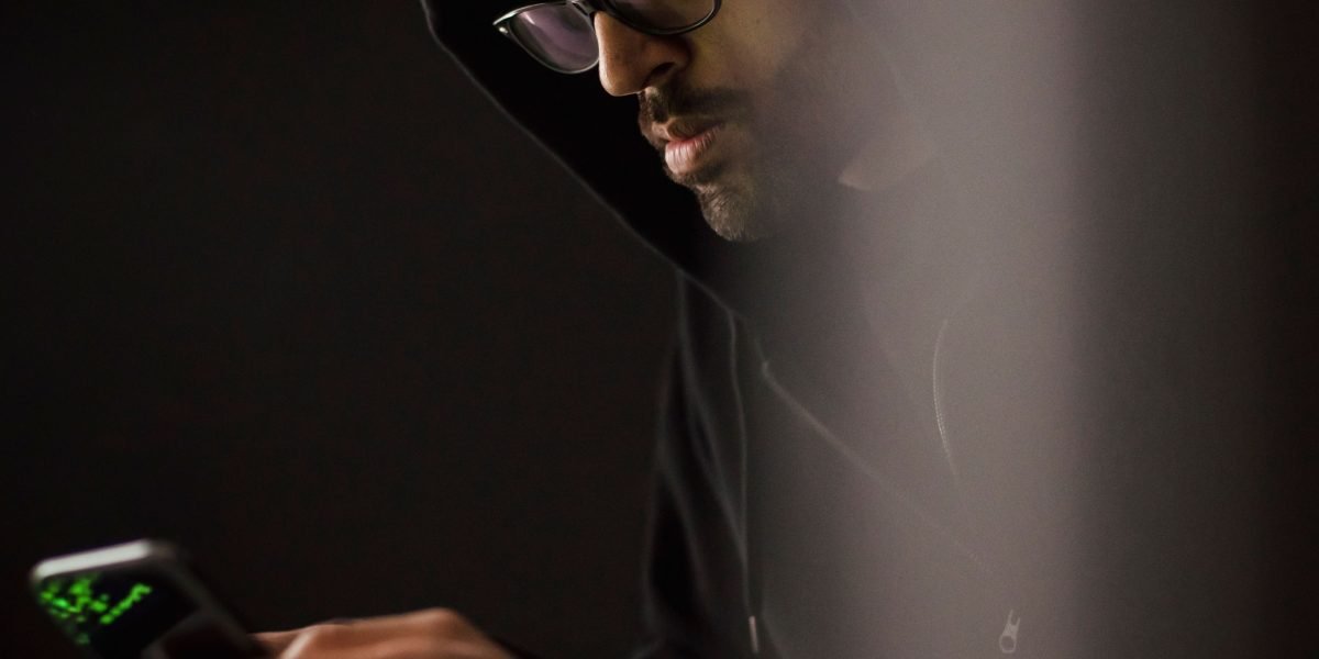 A person thoughtfully considers privacy implications, representing awareness about data security with new digital devices.
