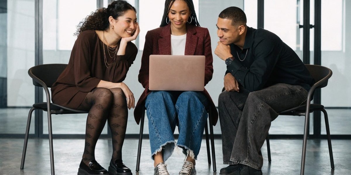 A team collaborating in a modern setting, symbolizing technology's impact on work and social interaction.