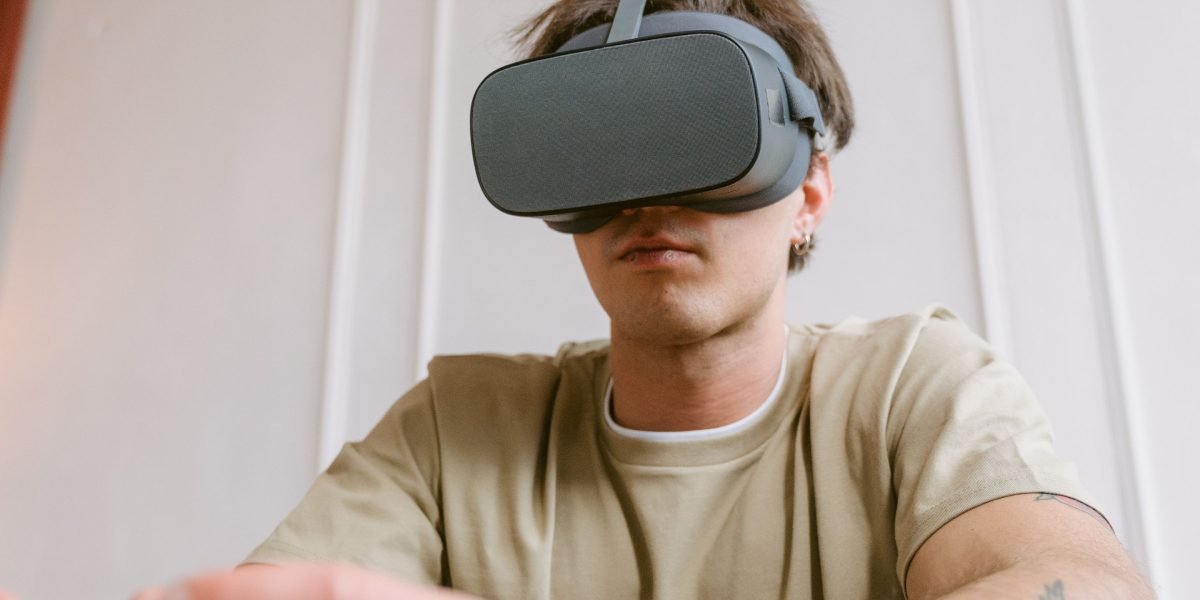 A person deeply engaged in a high-quality mobile game, highlighting the phone's processing power.