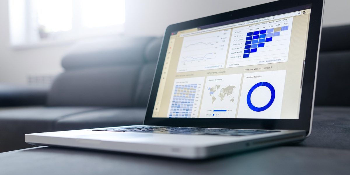 A professional analyzing reports with visualized data to gain quick insights and inform strategic decisions.