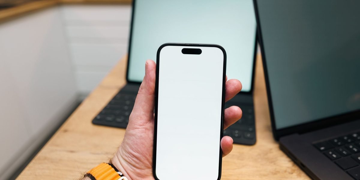 A person carefully reviewing and adjusting privacy and security settings on their smartphone.