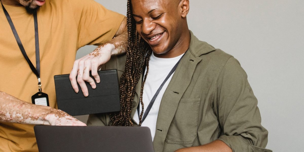 People of diverse backgrounds engaging with online content, representing the importance of accessibility.
