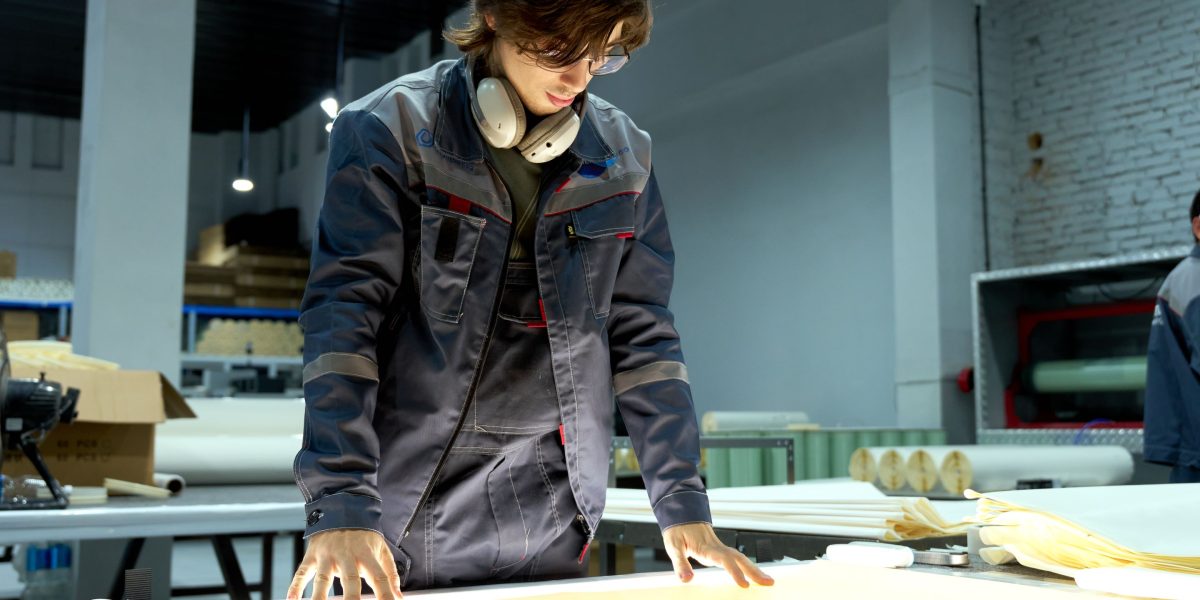 A person carefully examining a product, demonstrating diligence in avoiding misleading listings and potential scams when buying refurbished electronics.